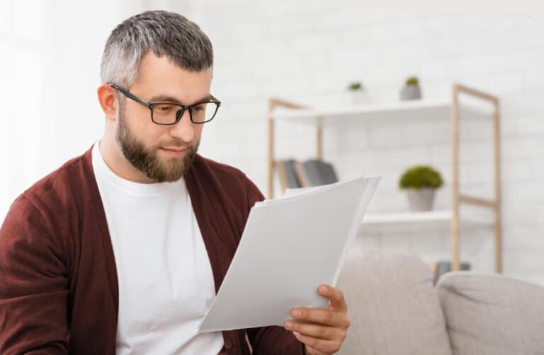 person reviewing a trust document